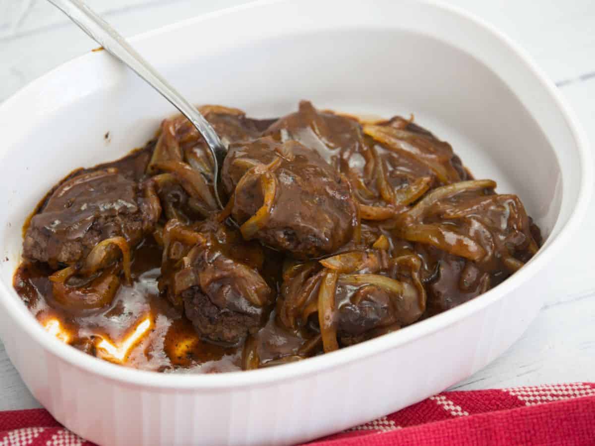 BBQ mini-meatloaves in a white serving dish