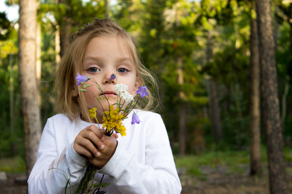 child with flowers