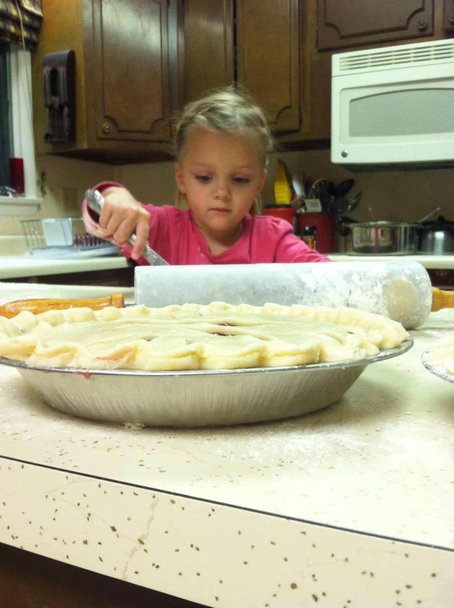 child helping cook