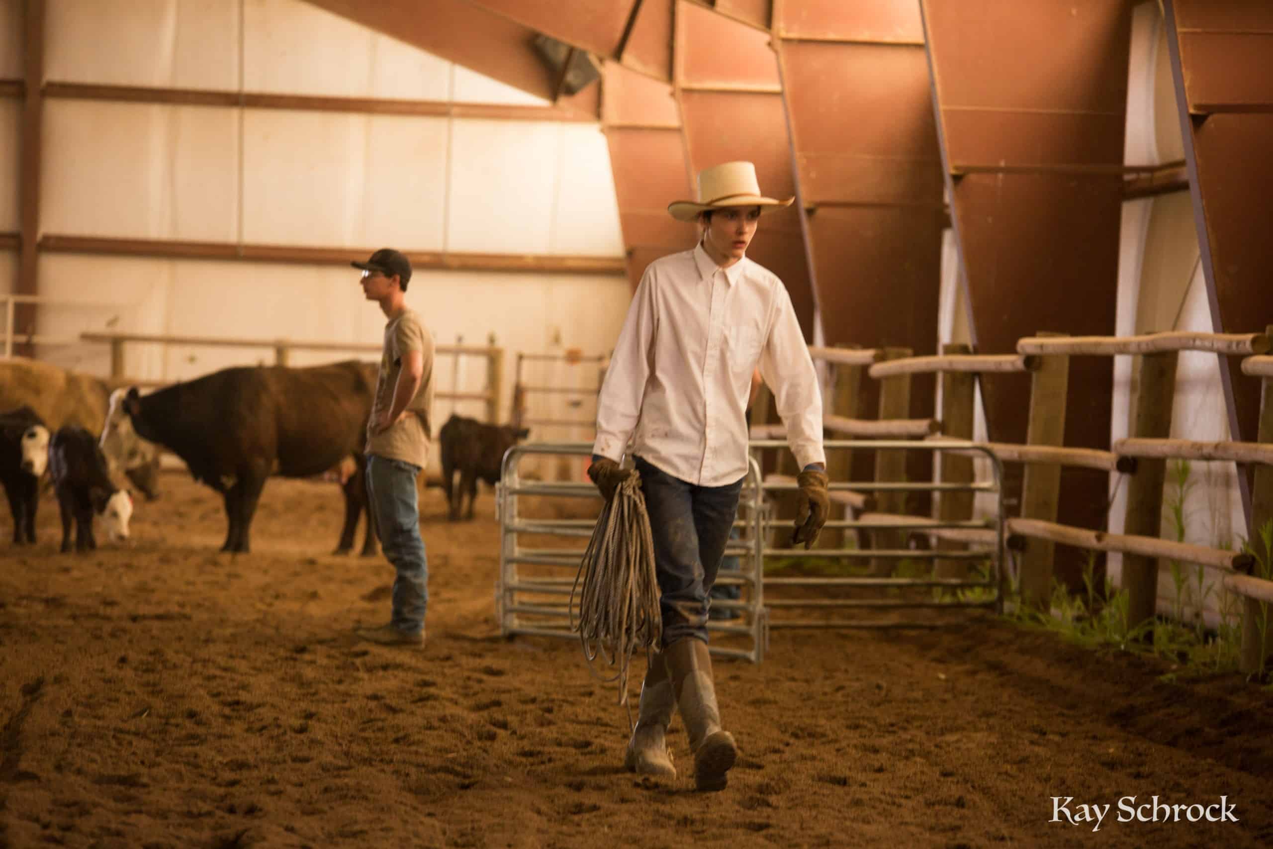 Esh Branding in Colorado - cowboy carrying rope