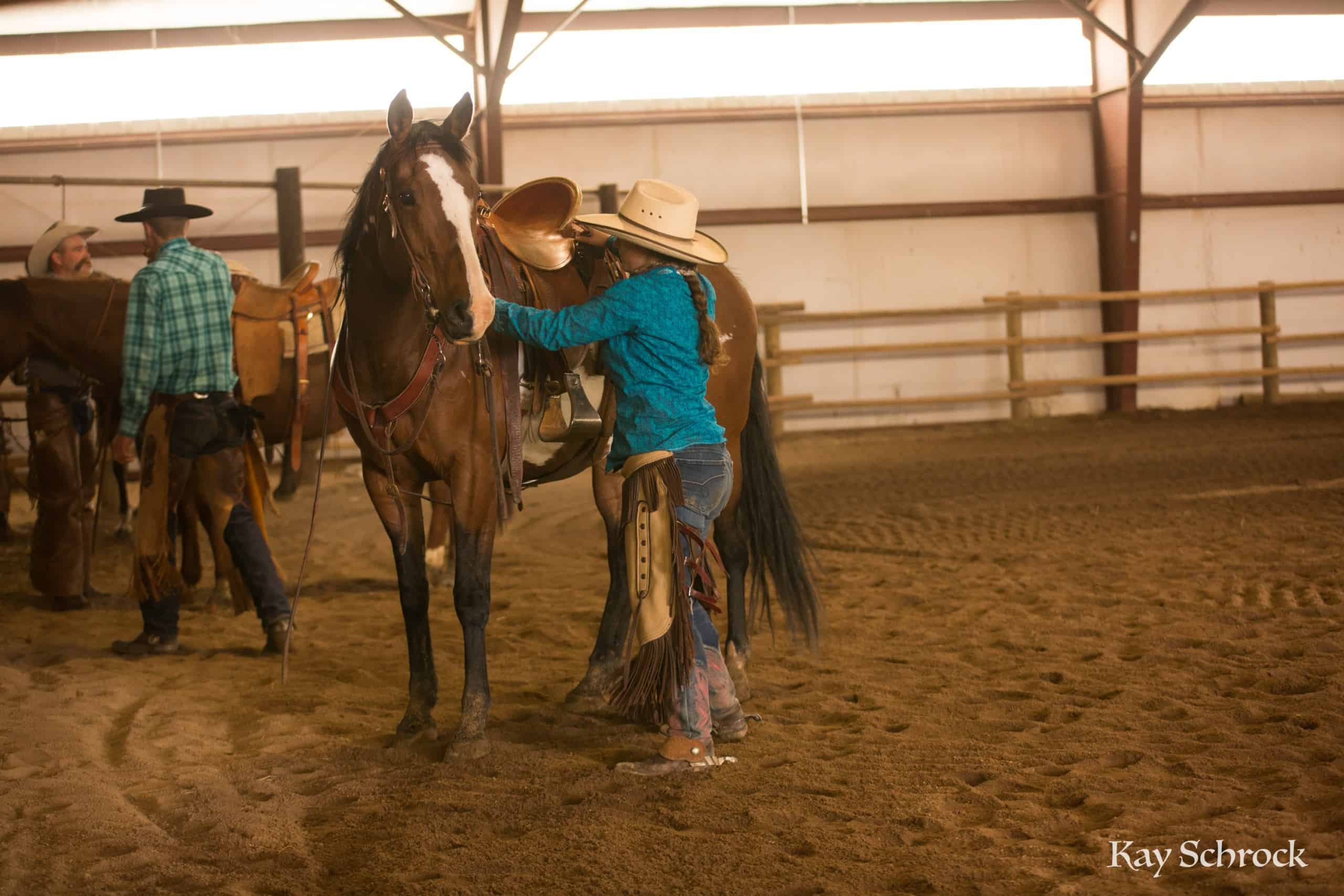 Esh Branding in Colorado - cowgirl and horse