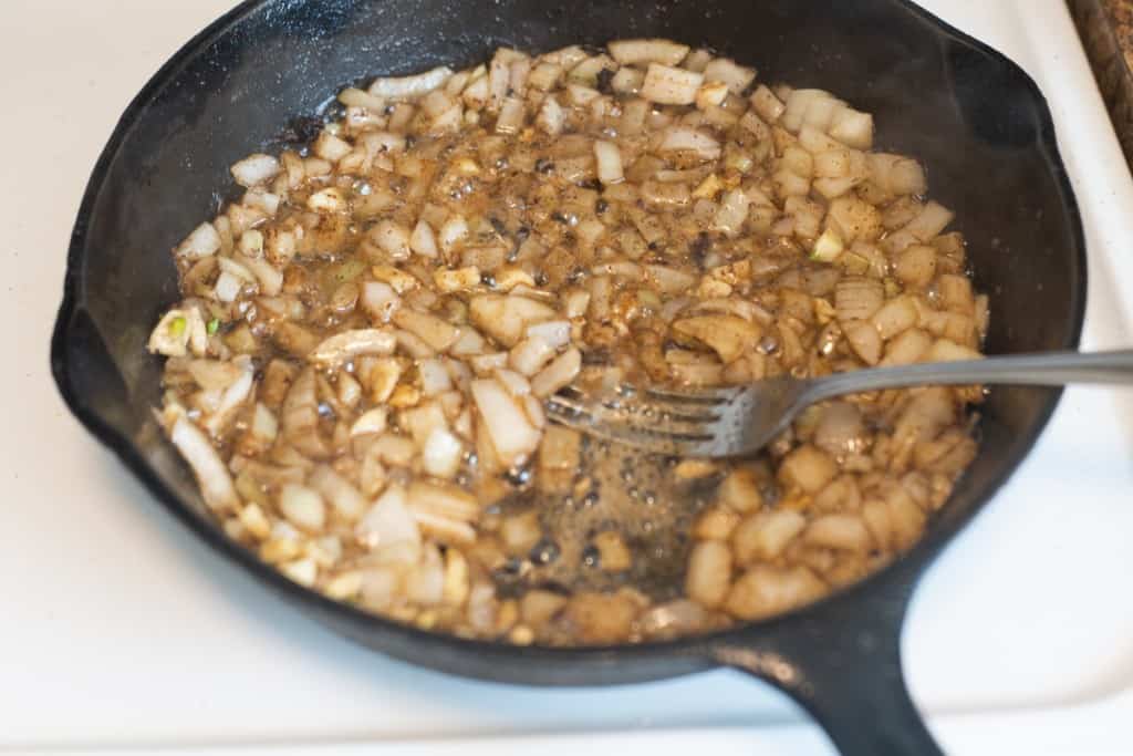 frying onions in pan