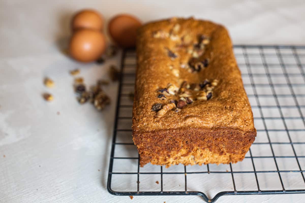 loaf of banana bread on cooling rack