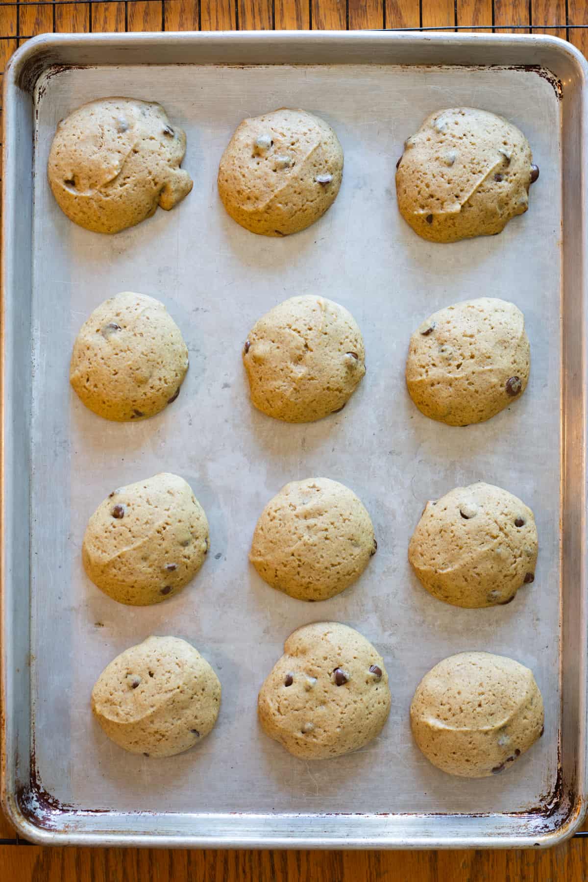 Pumpkin chocolate chip whoopie pies on baking tray