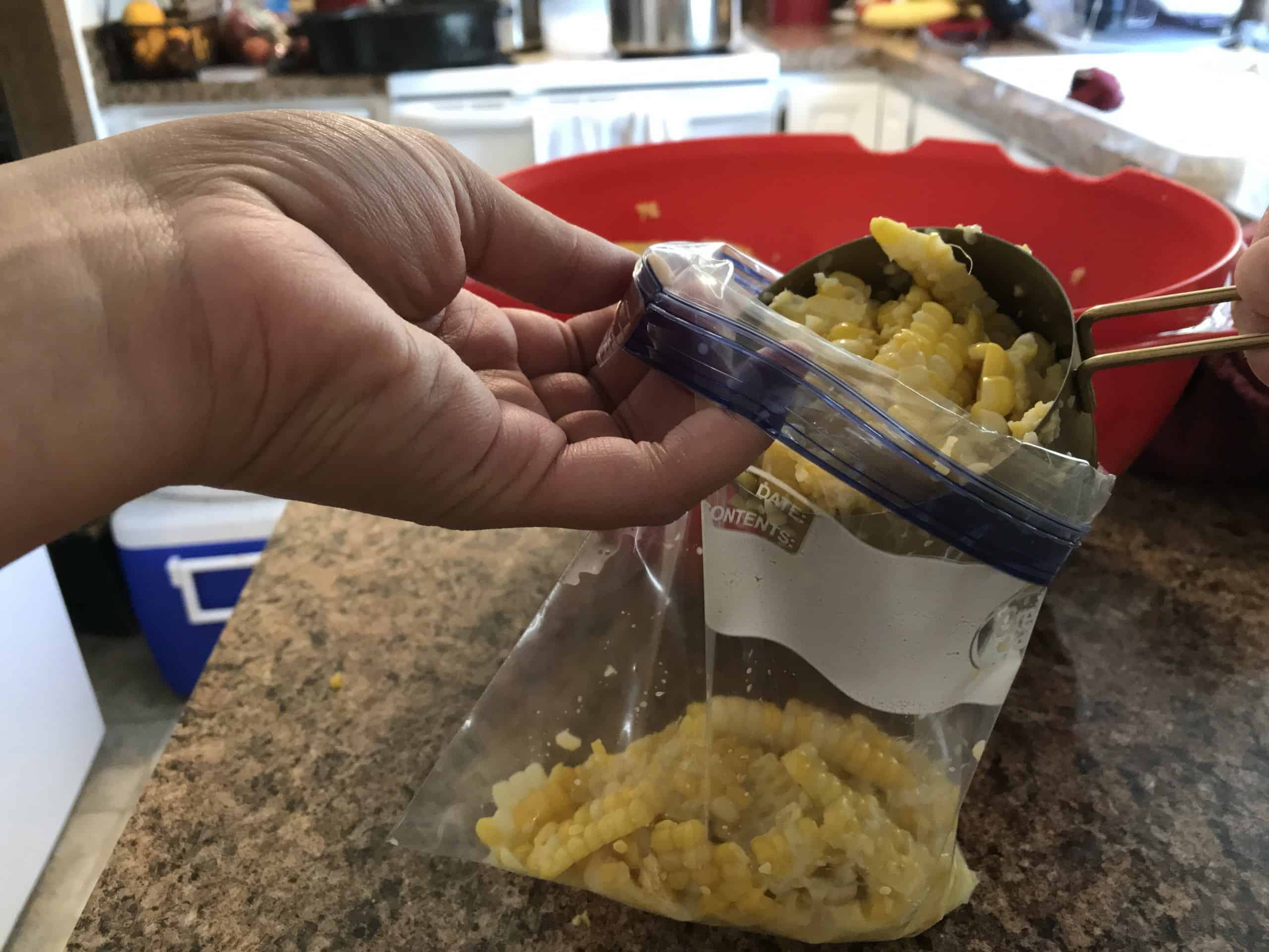 filling a quart bag with corn