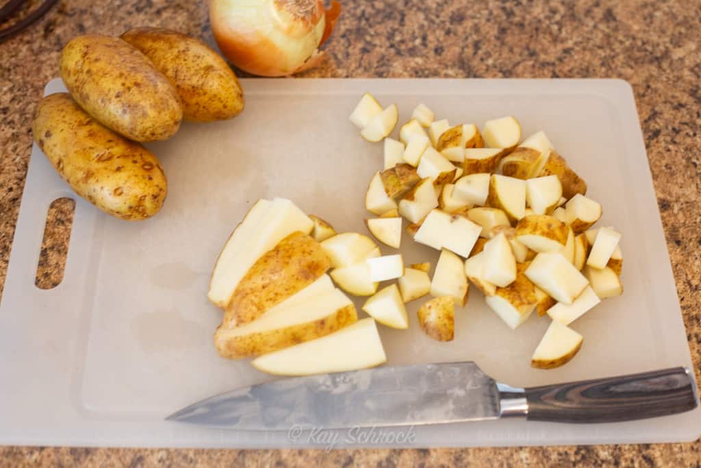diced potatoes on a cutting board