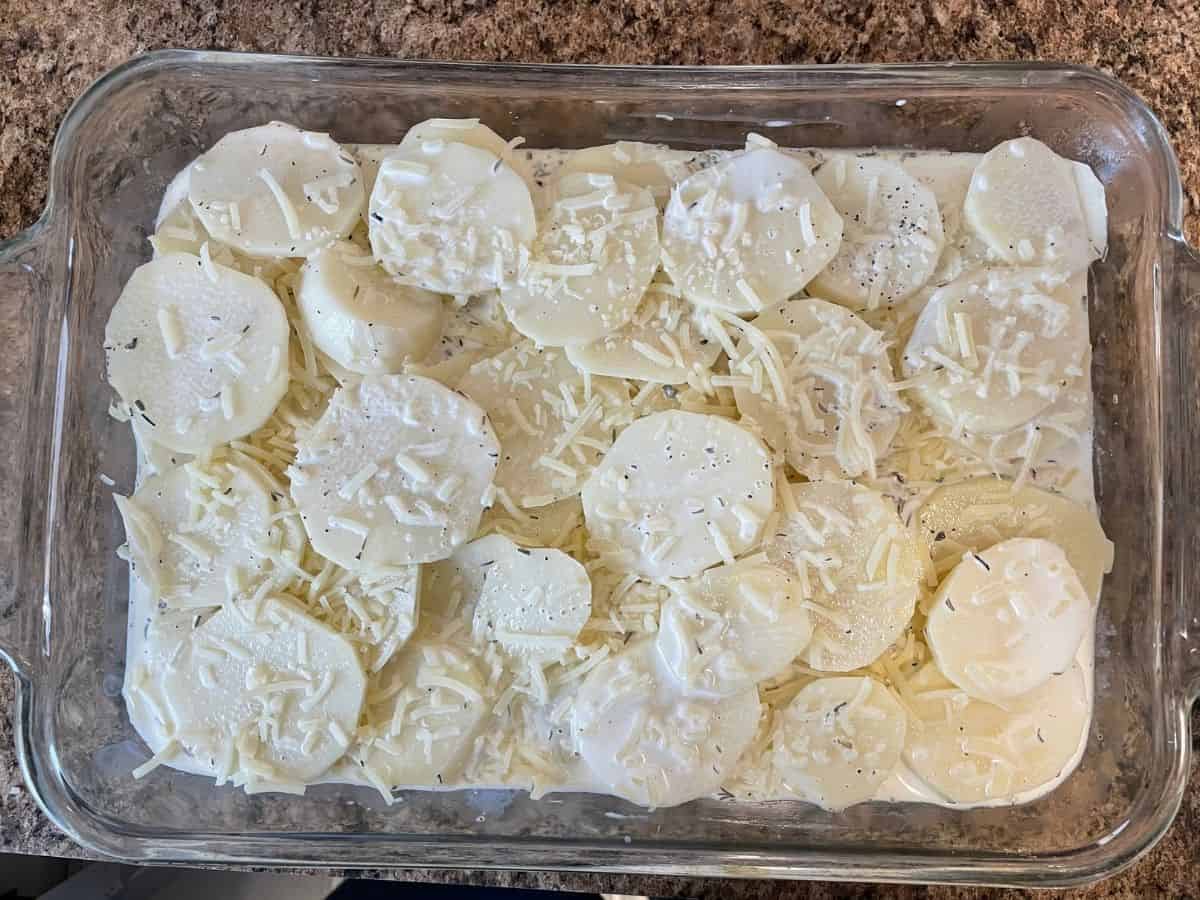 raw potato slices layered with cream and spices