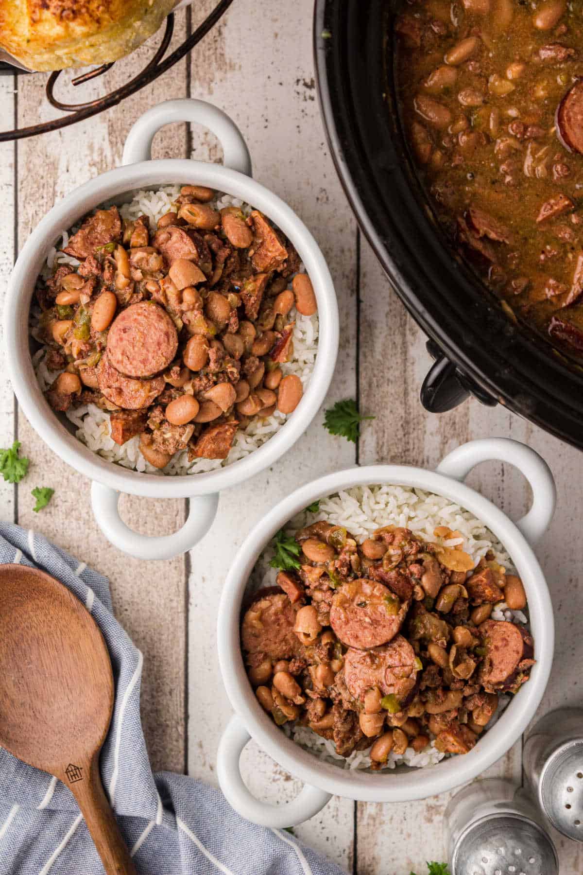two bowls of rice with meaty pinto beans