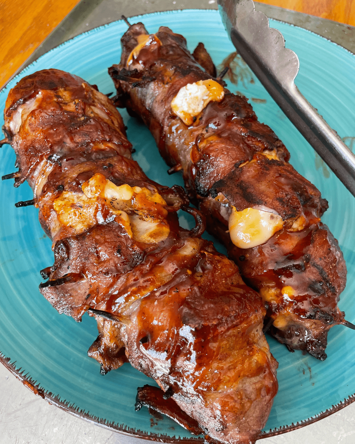 Applewood Bacon-Wrapped Venison Backstrap with Raspberry Sauce