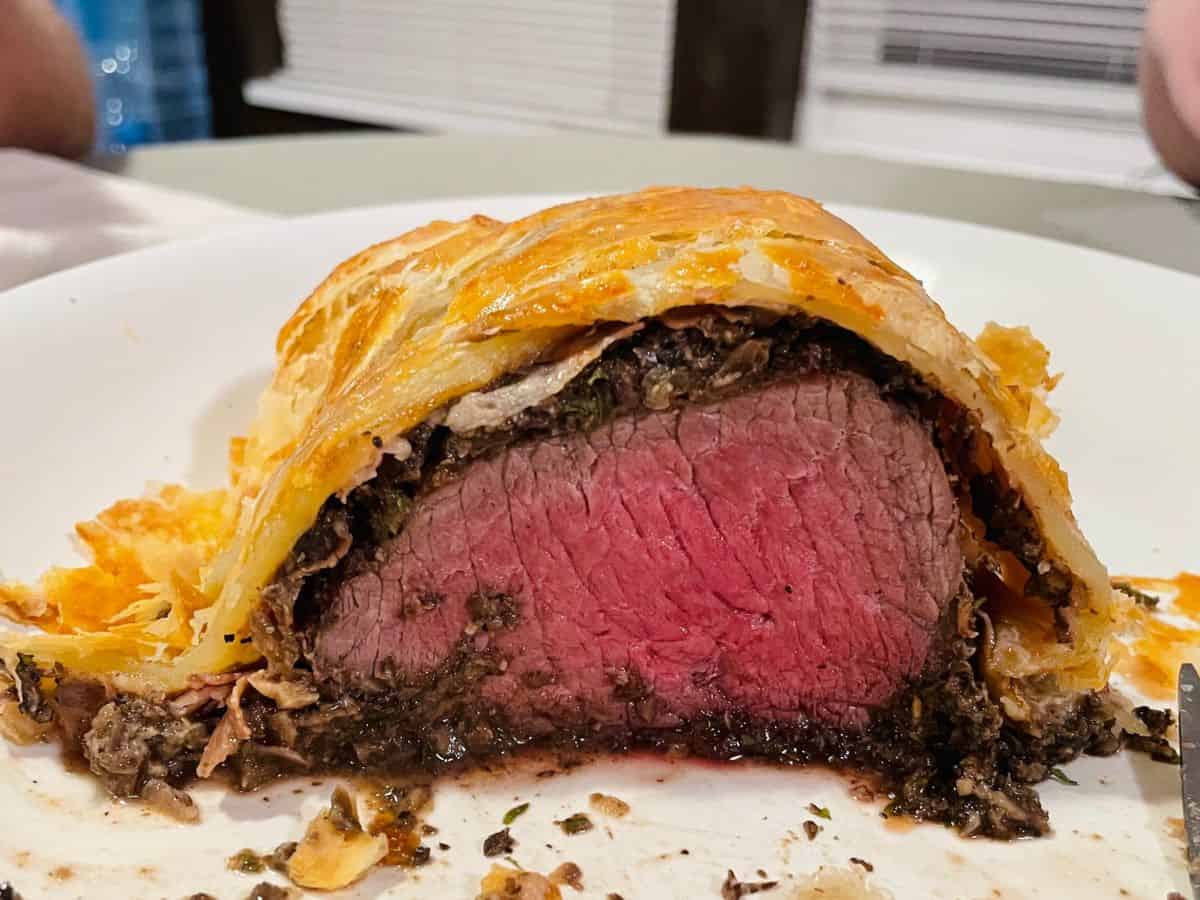 side cut view of a deer wellington slice