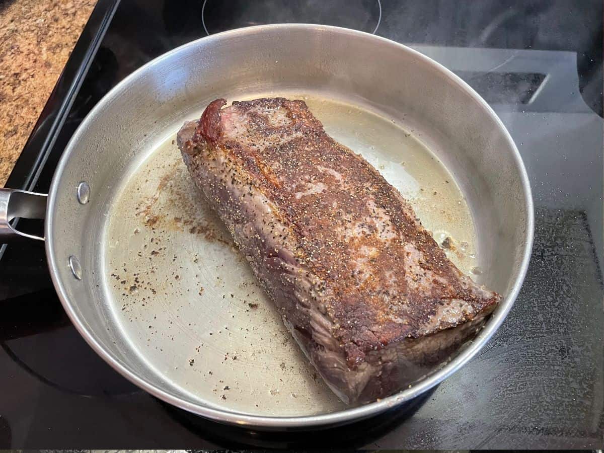 elk loin seared in frying pan