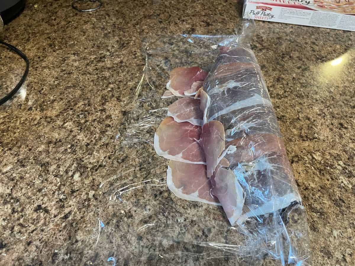 deer loin wrapped in prosciutto and duxelles