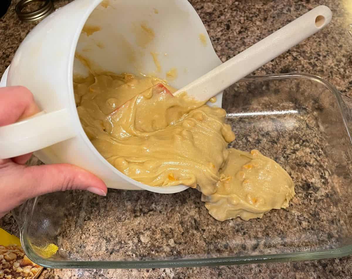 butterscotch bars batter pouring into baking pan