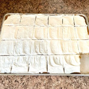 Banana Bars with cream cheese frosting in pan