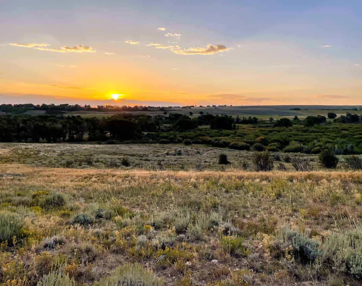 sunrise over ranch land Wyoming