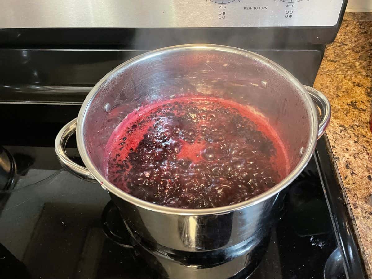 Oregon grape juice boiling on stove