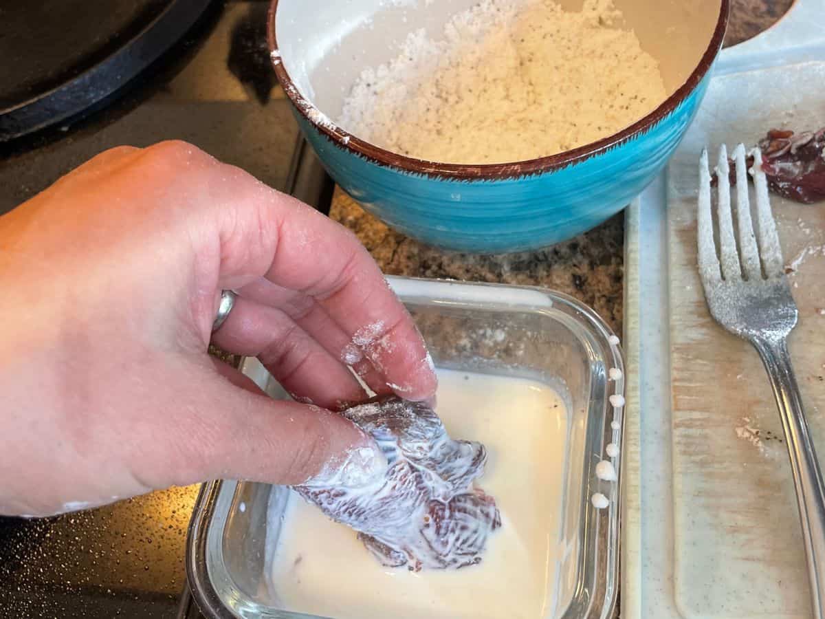 steak bites being dipped into cream
